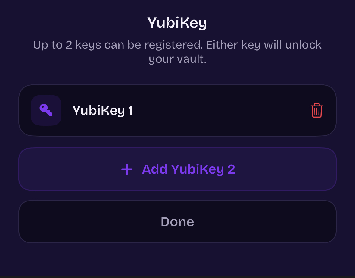ArkWarden YubiKey management screen showing YubiKey 1 registered, an option to add YubiKey 2, and a note that either key will unlock your vault
