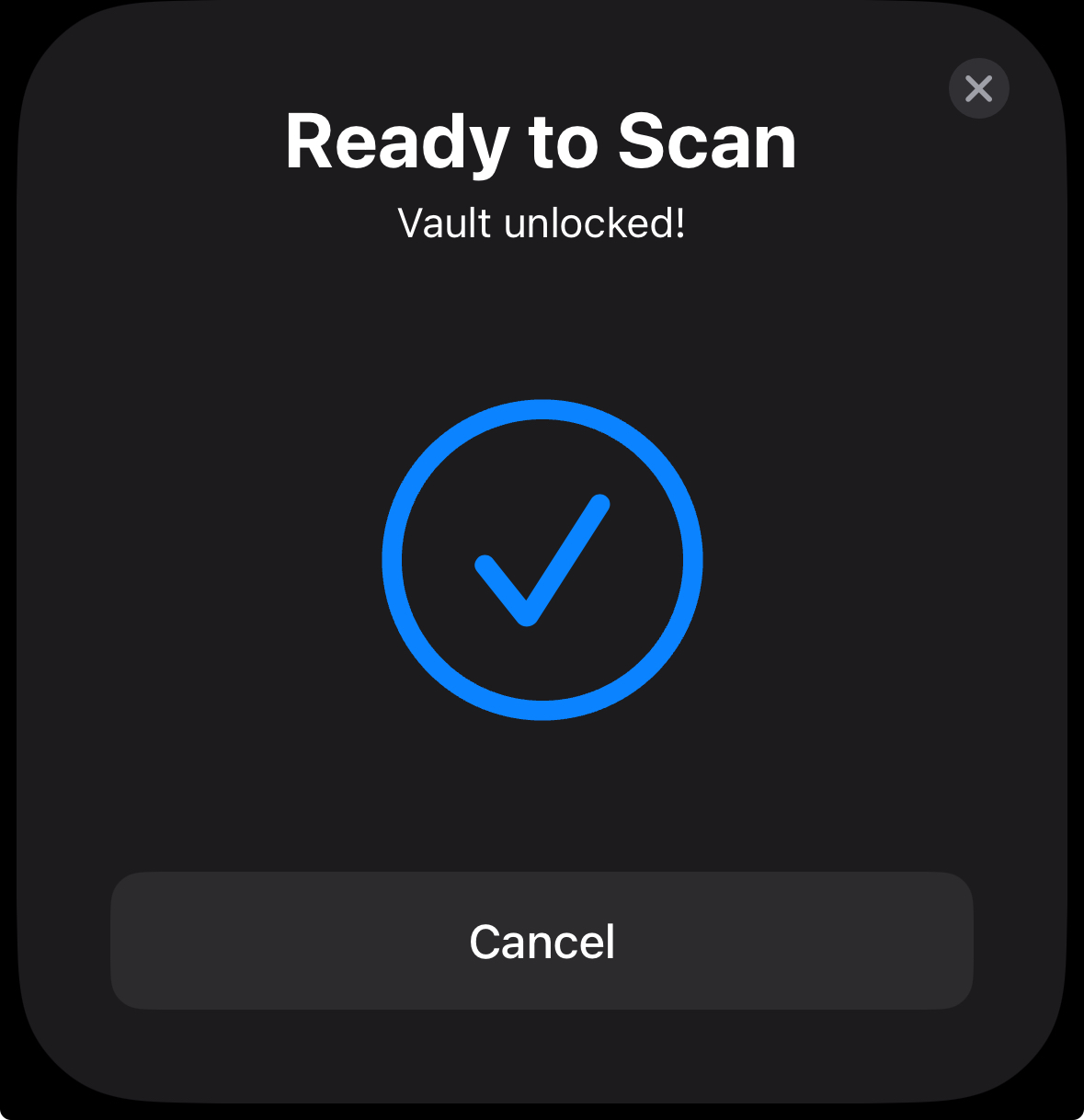 iOS NFC sheet confirming the vault is unlocked with a checkmark